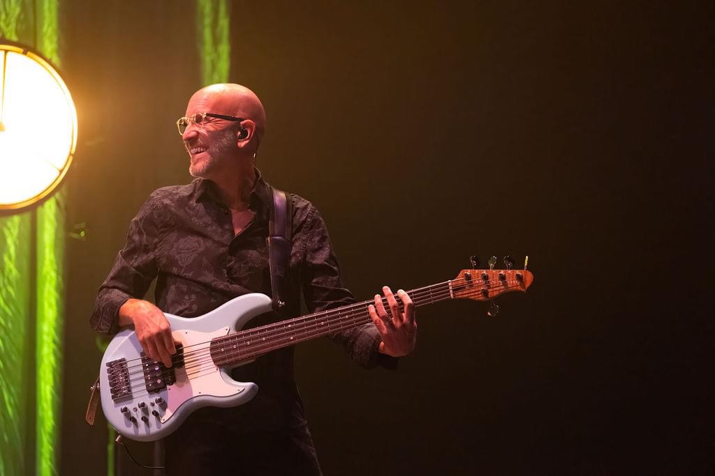 Clay Krasner performing live on bass guitar